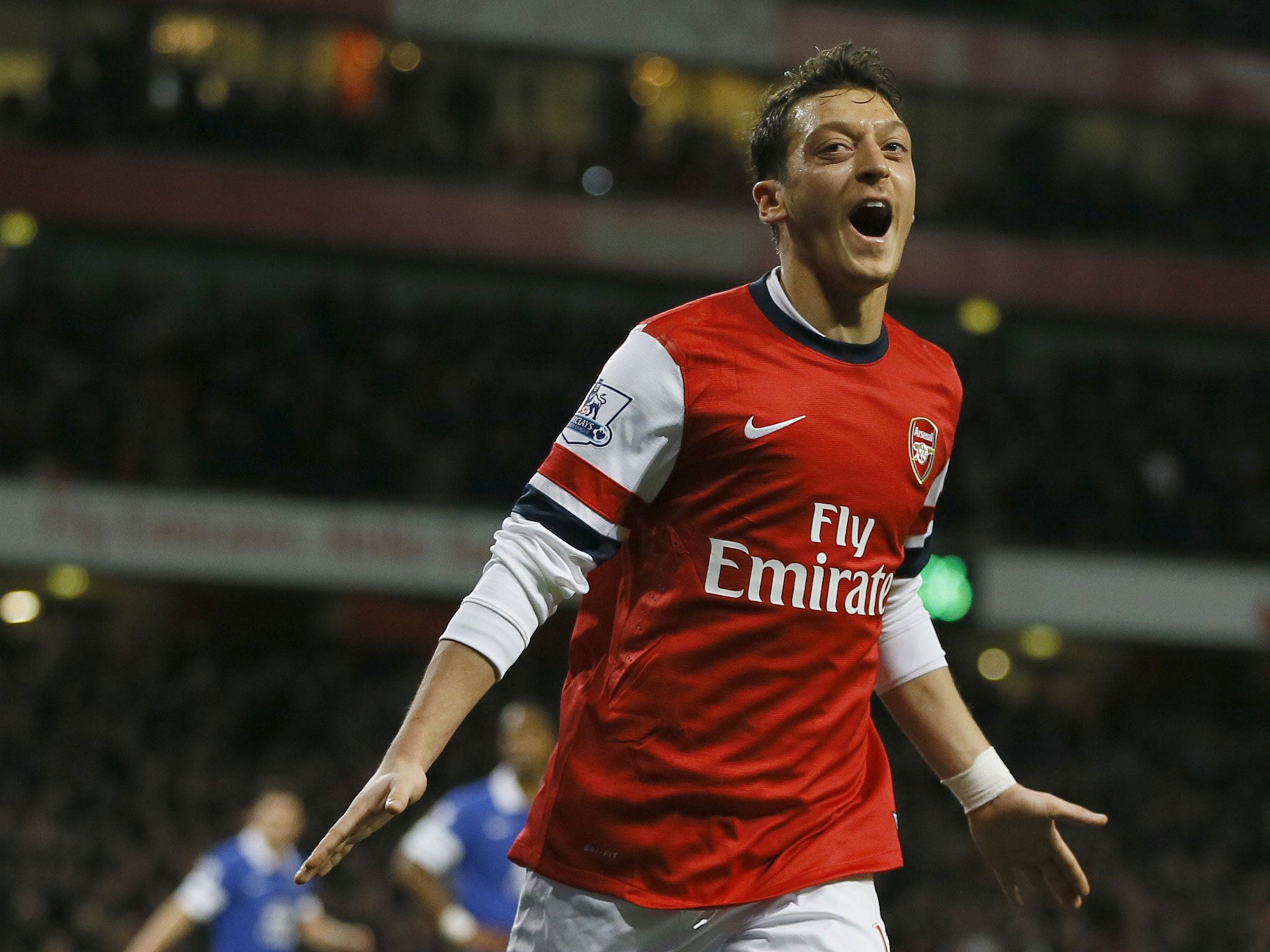Mesut Ozil's Arsenal could go top of the league for Christmas with a win over Chelsea on Monday night