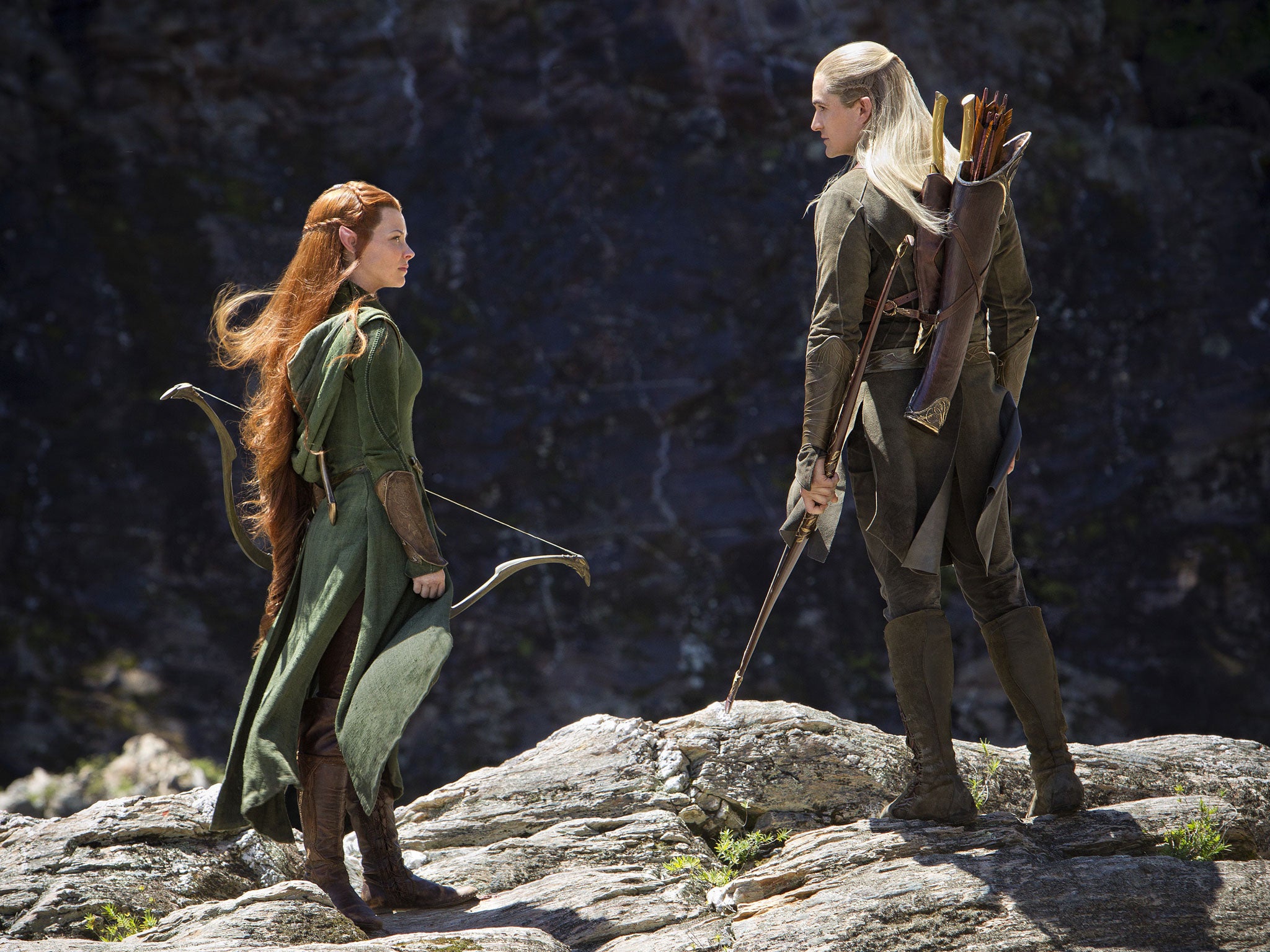 Evangeline Lilly, left, plays Tauriel, while Orlando Bloom reprises his role as Legolas in 'The Desolation of Smaug'