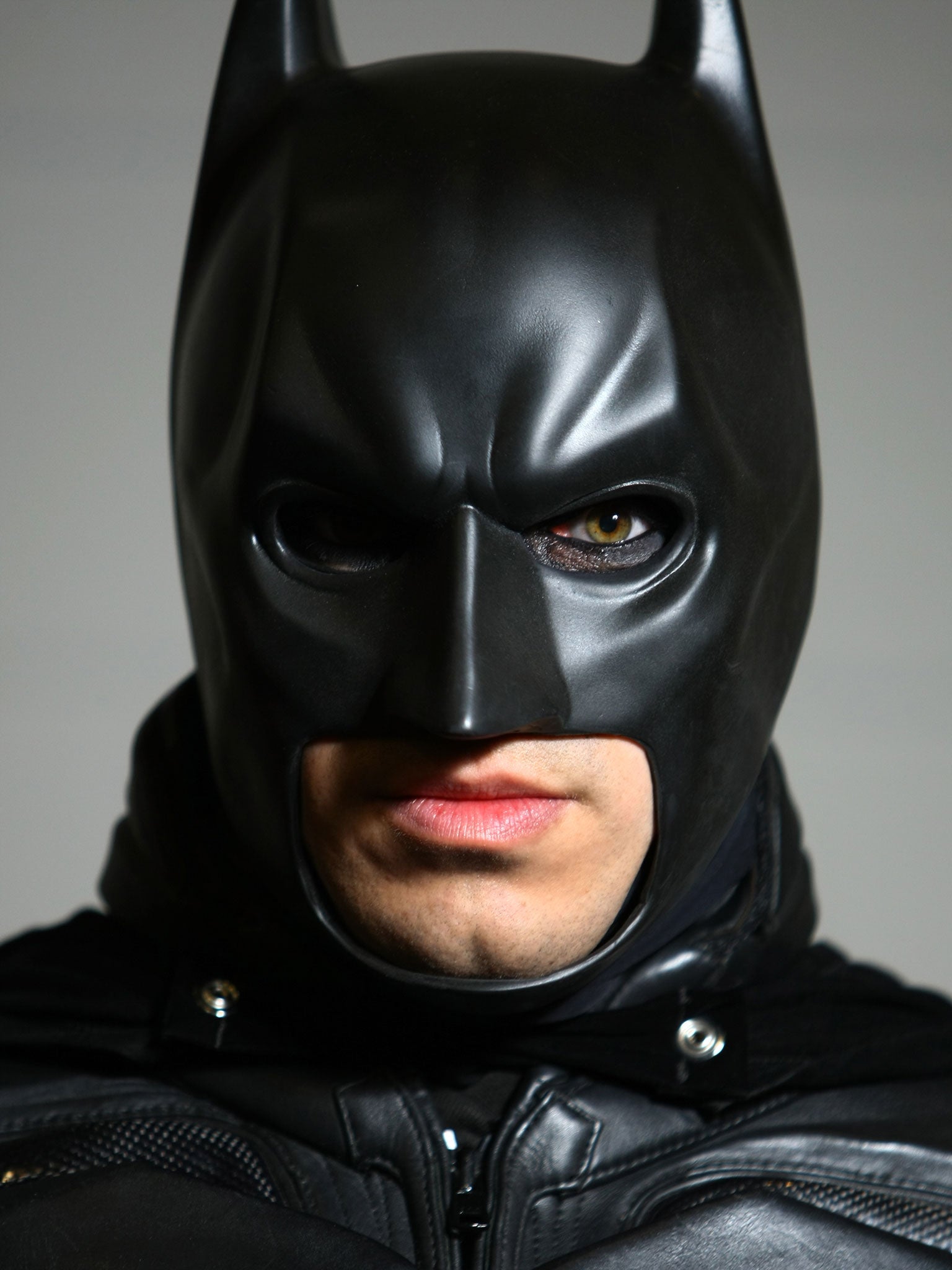 A man in a Batman costume similar to the one worn by the angered impersonator in New York.