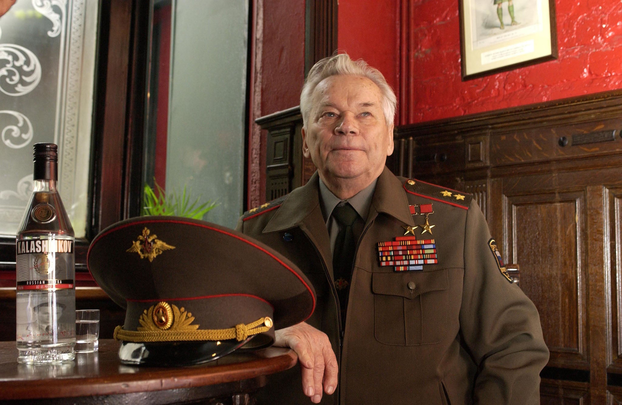 With his stocky frame, and his general’s uniform smothered with medals, Mikhail Kalashnikov looked the quintessential Soviet military veteran