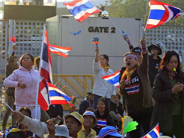 Thai anti-government protesters gather in front of a registration venue for election candidates at the Thai-Japan Stadium in Bangkok,