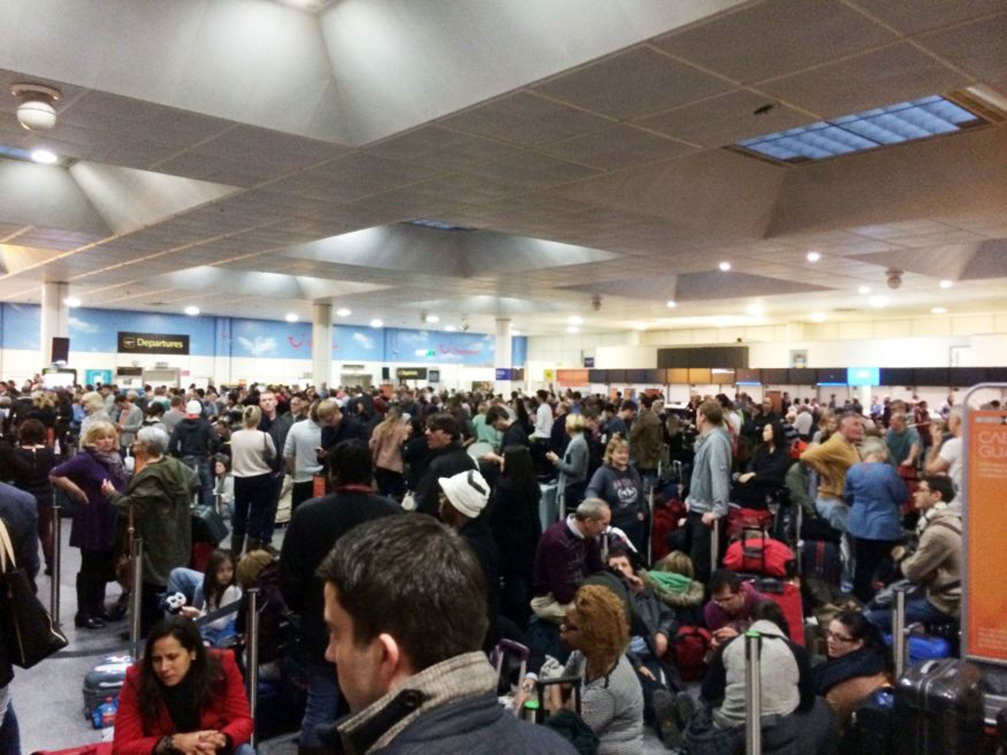 Passengers waiting at the North Terminal at Gatwick Airport, as passengers were left 'in limbo' at the airport's North Terminal as a power outage added to the travel misery felt across the country