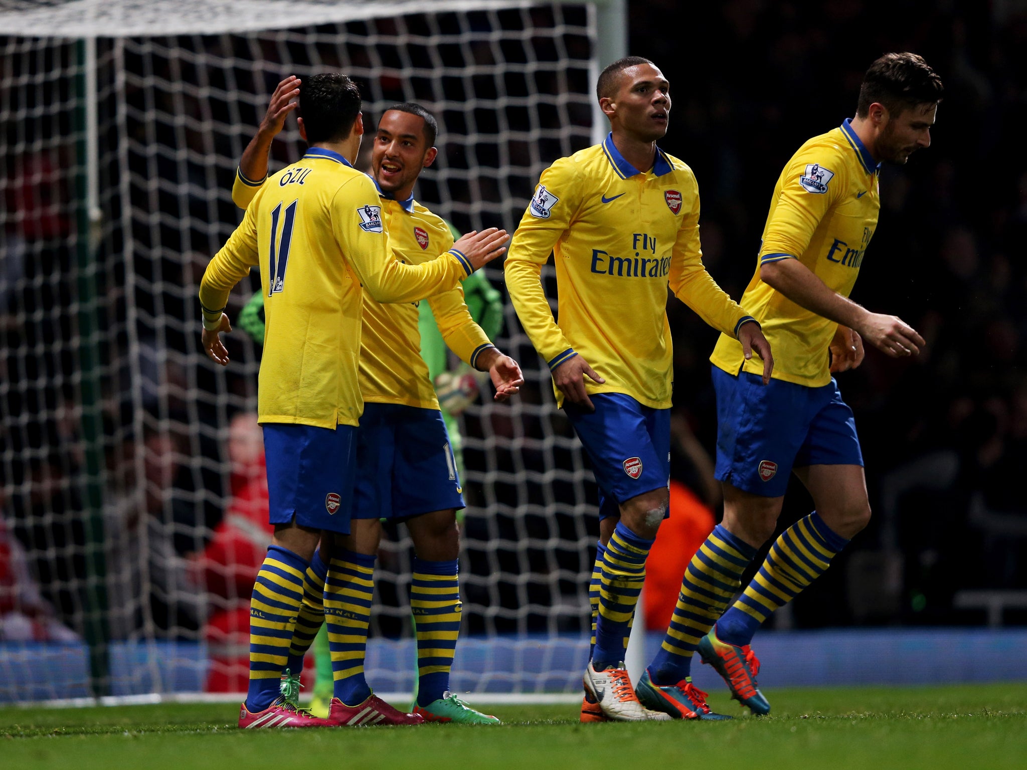 Theo Walcott celebrates after scoring for Arsenal in their match against West Ham