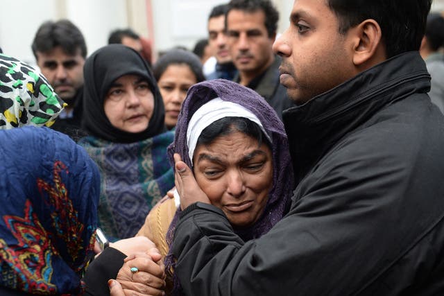 Fatima Khan, mother of Abbas Khan, is comforted by her son