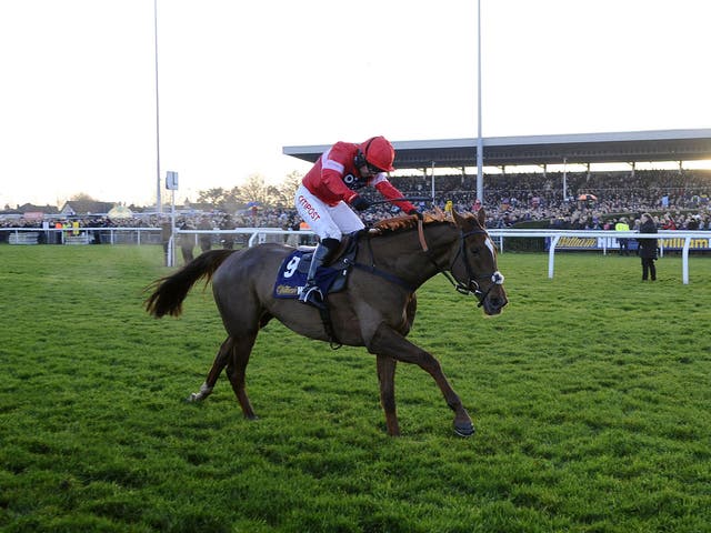 Silviniaco Conti, ridden by Noel Fehily, wins the King George VI Chase at Kempton