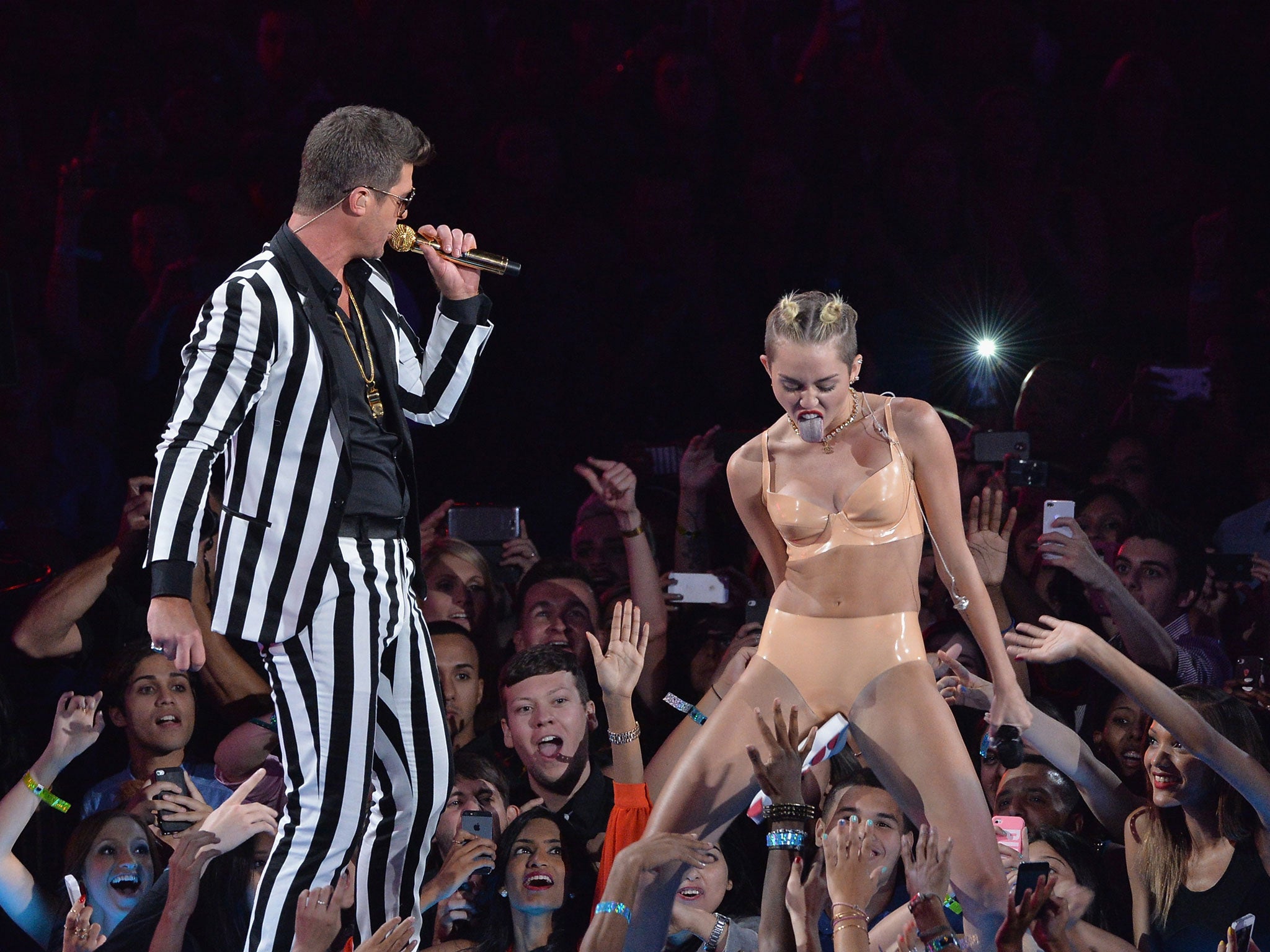 Robin Thicke and Miley Cyrus perform on stage during the 2013 MTV Video Music Awards