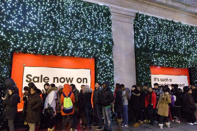 Shoppers queue in the early morning outside Selfridges department store in central London in search of a bargain in the post Christmas Boxing Day sales