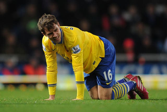 Arsenal midfielder Aaron Ramsey goes down injured with a thigh strain in win at West Ham.