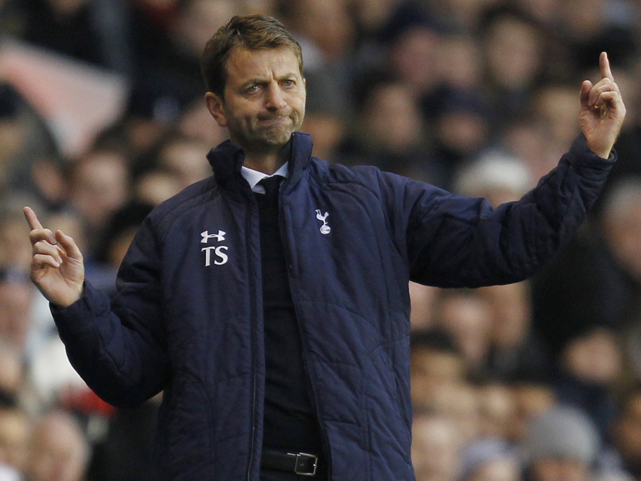 New Tottenham head coach Tim Sherwood gestures to his players 