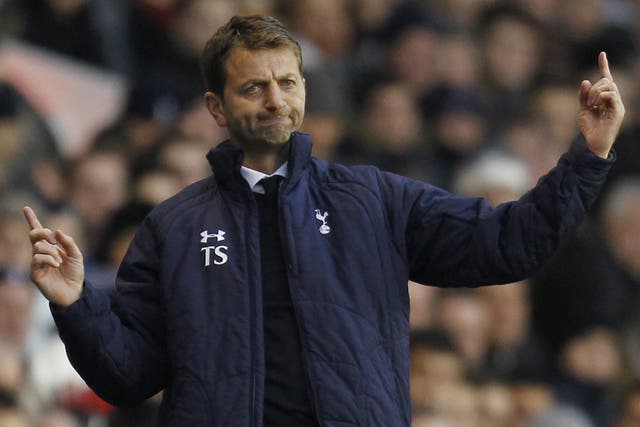 New Tottenham head coach Tim Sherwood gestures to his players during match with West Brom.