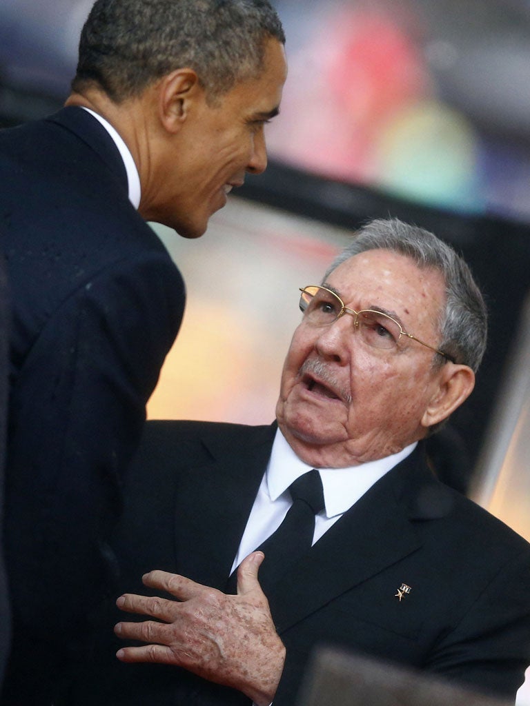 Obama upset many by shaking hands with Raoul Castro at Nelson Mandela’s memorial