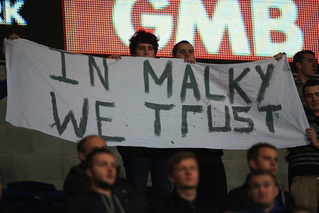 Cardiff City fans show their support for manager Malky Mackay during the Boxing Day defeat to Southampton