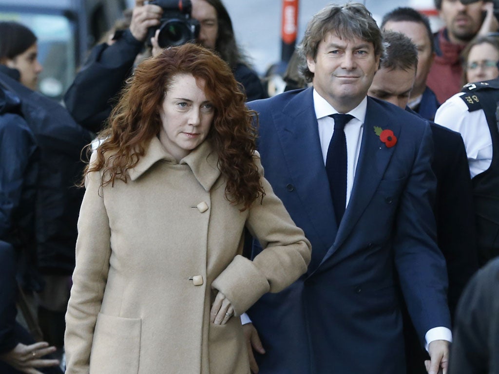 On trial: Rebekah Brooks (left) with her husband