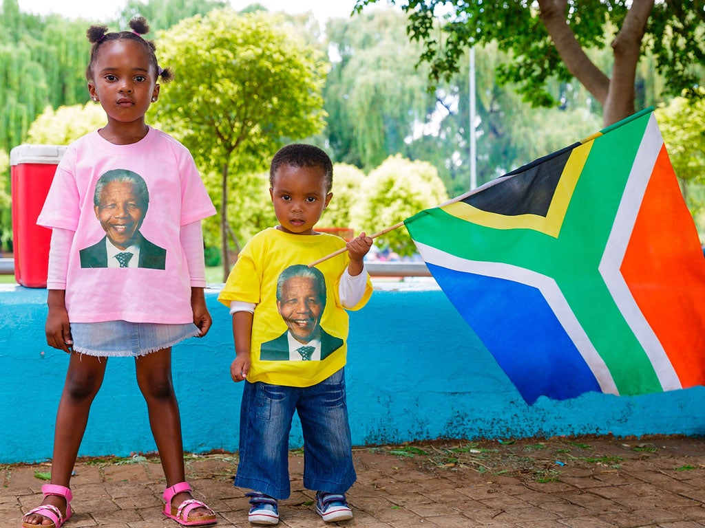 Two children celebrate Nelson Mandela