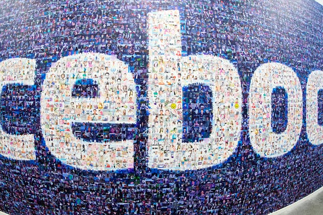 A Facebook logo made up from pictures of users. TIME has developed a tool that estimates how many days you have wasted on the site