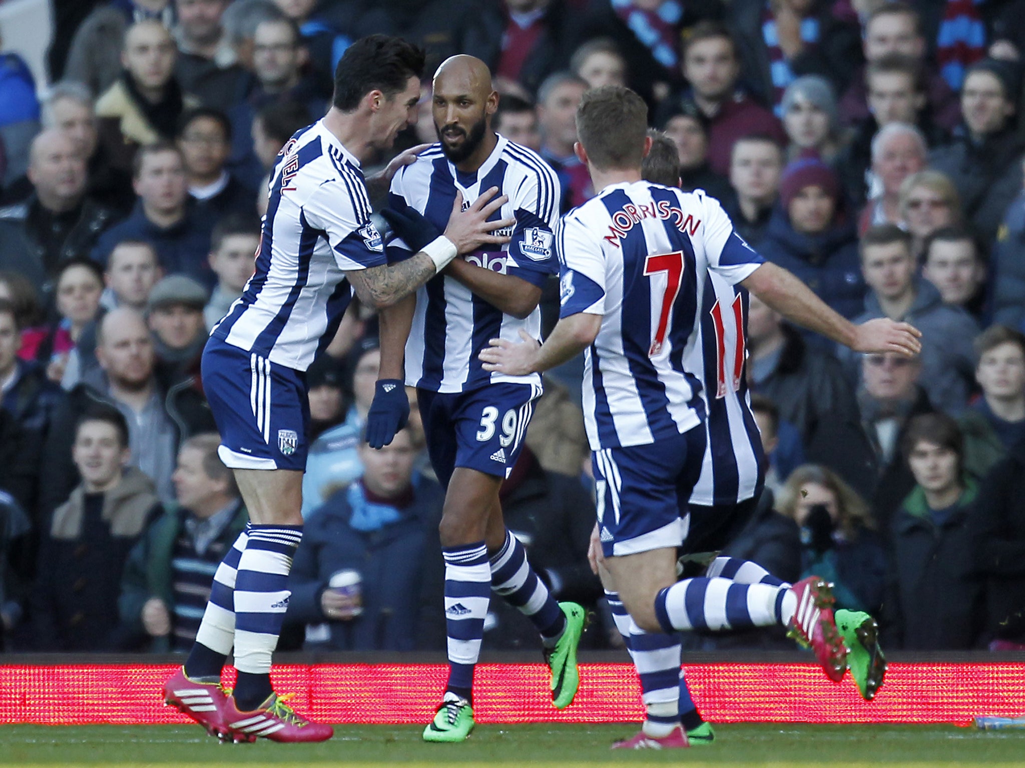 West Brom striker Nicolas Anelka makes an alleged anti-Semitic gesture when celebrating his first goal against West Ham