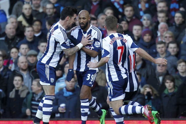 West Brom striker Nicolas Anelka makes an alleged anti-Semitic gesture when celebrating his first goal against West Ham