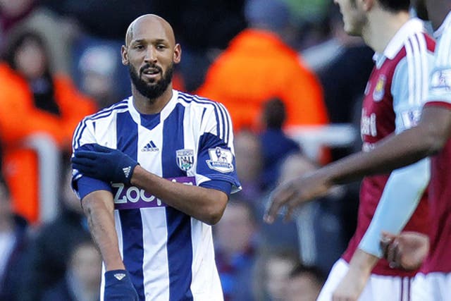 Nicolas Anelka appears to make the 'la quenelle' gesture after scoring the first goal for West Brom in the 3-3 draw against West Ham
