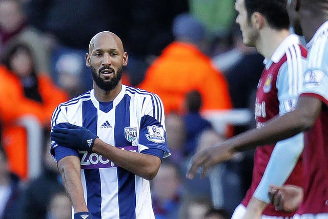 Nicolas Anelka appears to make the 'la quenelle' gesture after scoring the first goal for West Brom in the 3-3 draw against West Ham