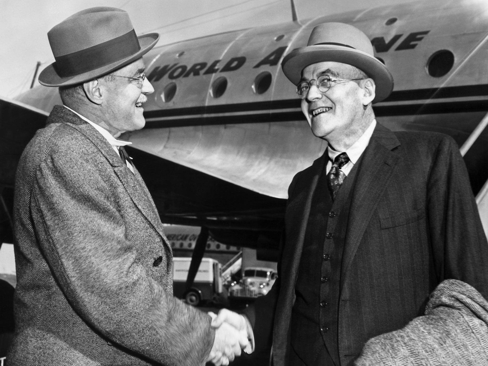 John Foster Dulles greets his brother Alan at the airport