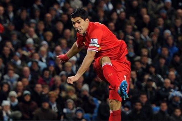 Luis Suarez of Liverpool comes close during the Barclays Premier League match between Manchester United and Liverpool 