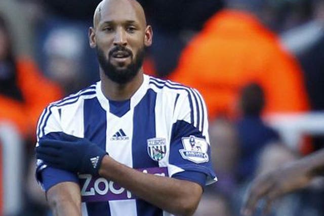 West Brom striker Nicolas Anelka makes an alleged anti-Semitic gesture when celebrating his first goal against West Ham on Saturday
