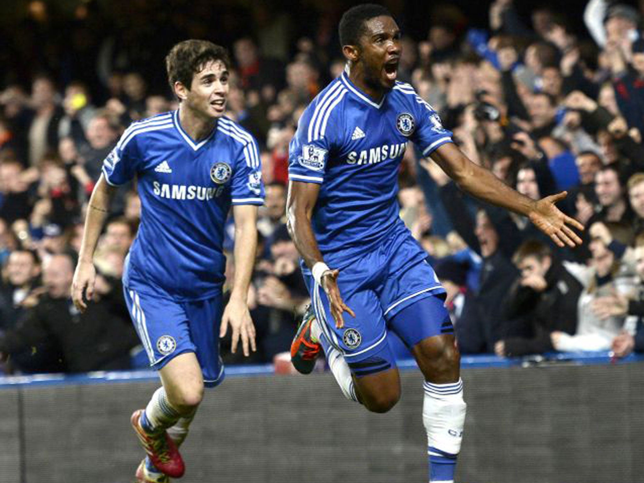 Oscar (left) celebrates Samuel Eto'o's winner for Chelsea with the striker
