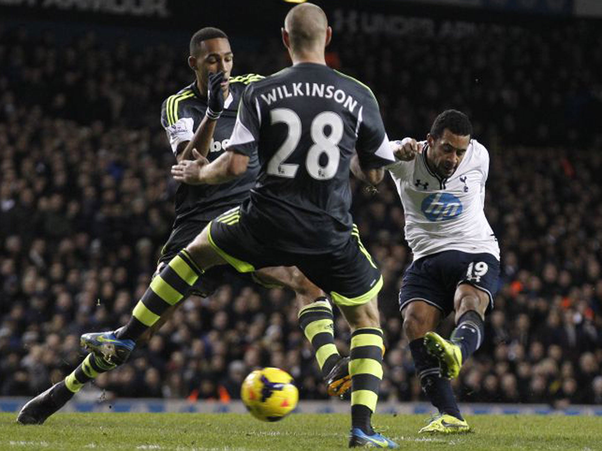 Tottenham's Mousa Dembele (right) scores against Stoke