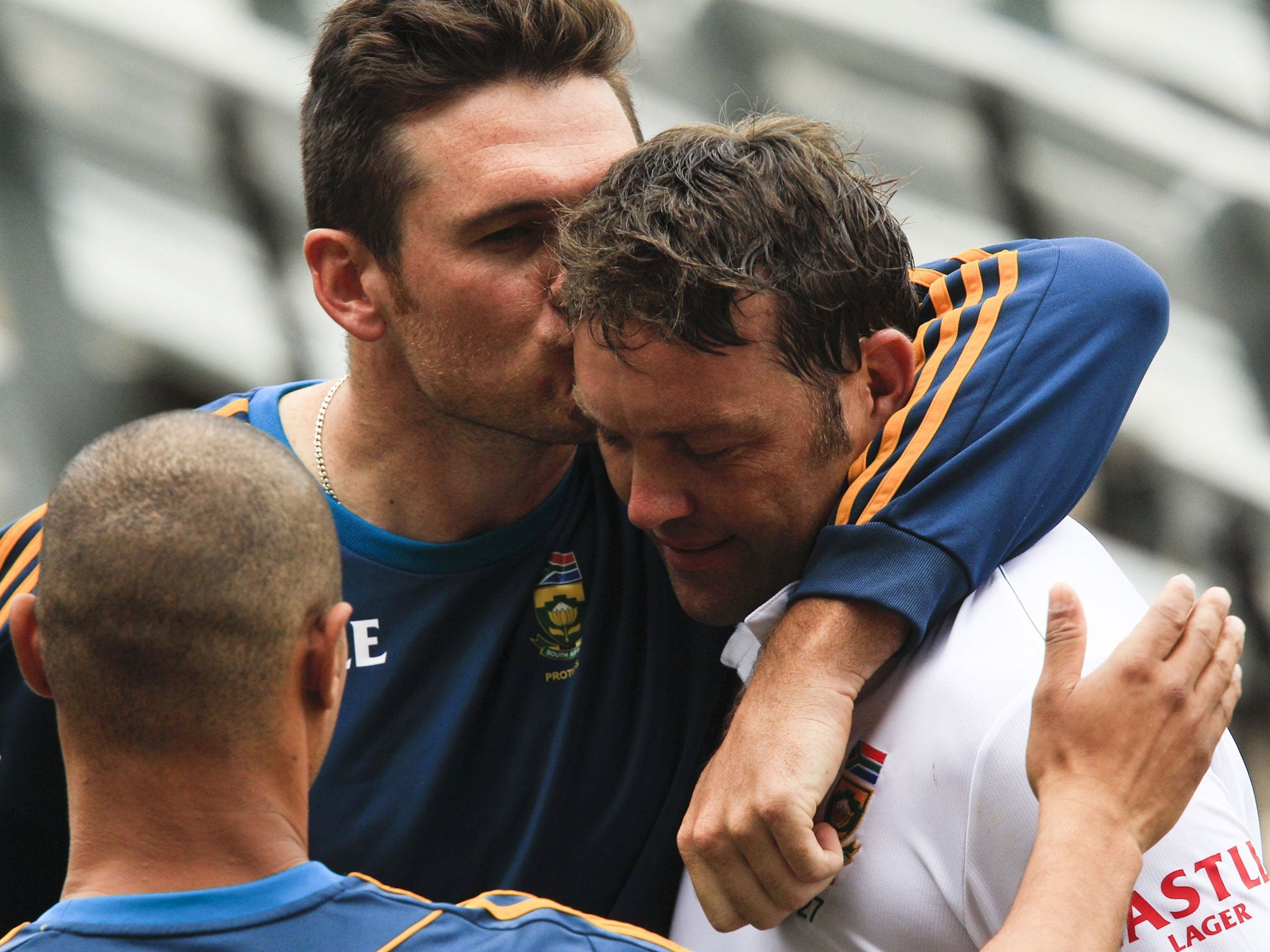 Jacques Kallis gets a kiss on the head from South Africa captain Graeme Smith after the all-rounder's century