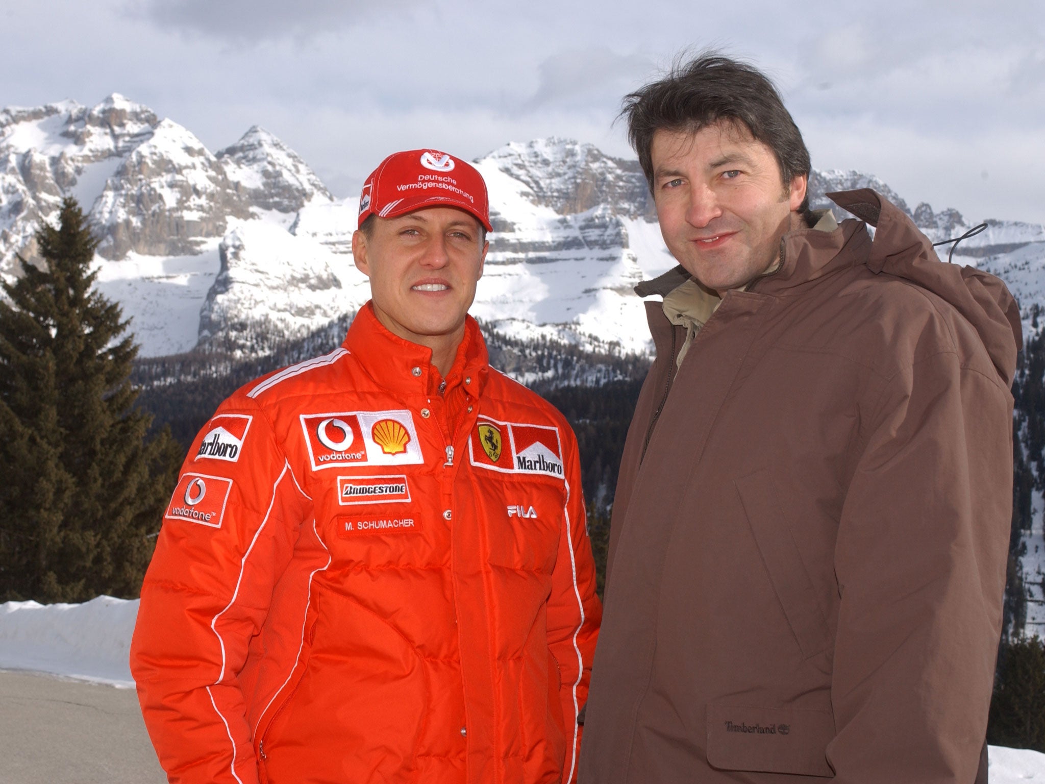 The Independent's Kevin Garside (R) meets seven-time Formula One World Champion Michael Schumacher