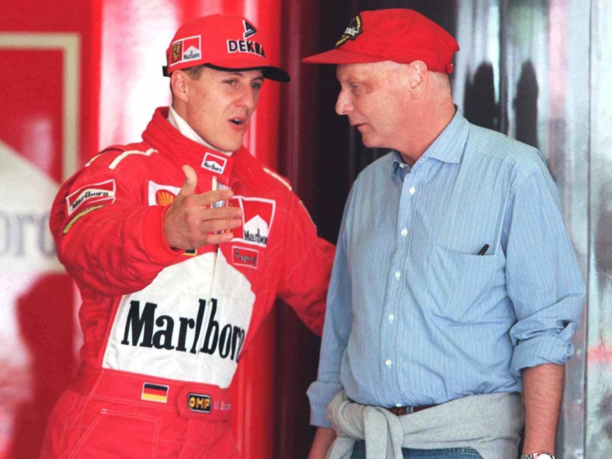 Michael Schumacher and Niki Lauda talk during the Spanish Grand Prix weekend in 1998