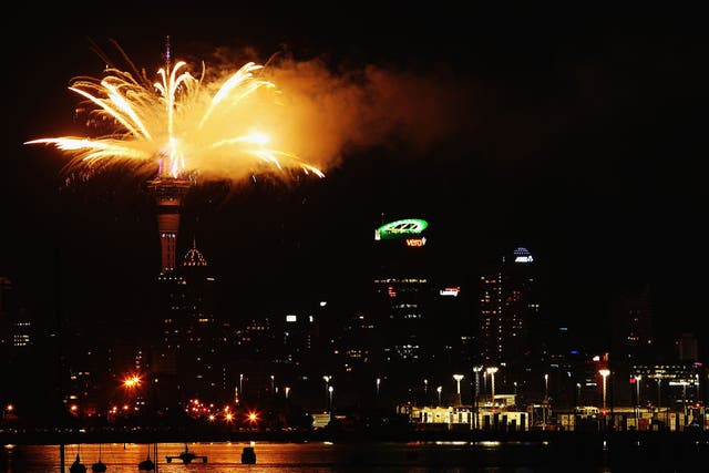 Fireworks are set off from the Auckland Sky Tower in New Zealand to see in 2014