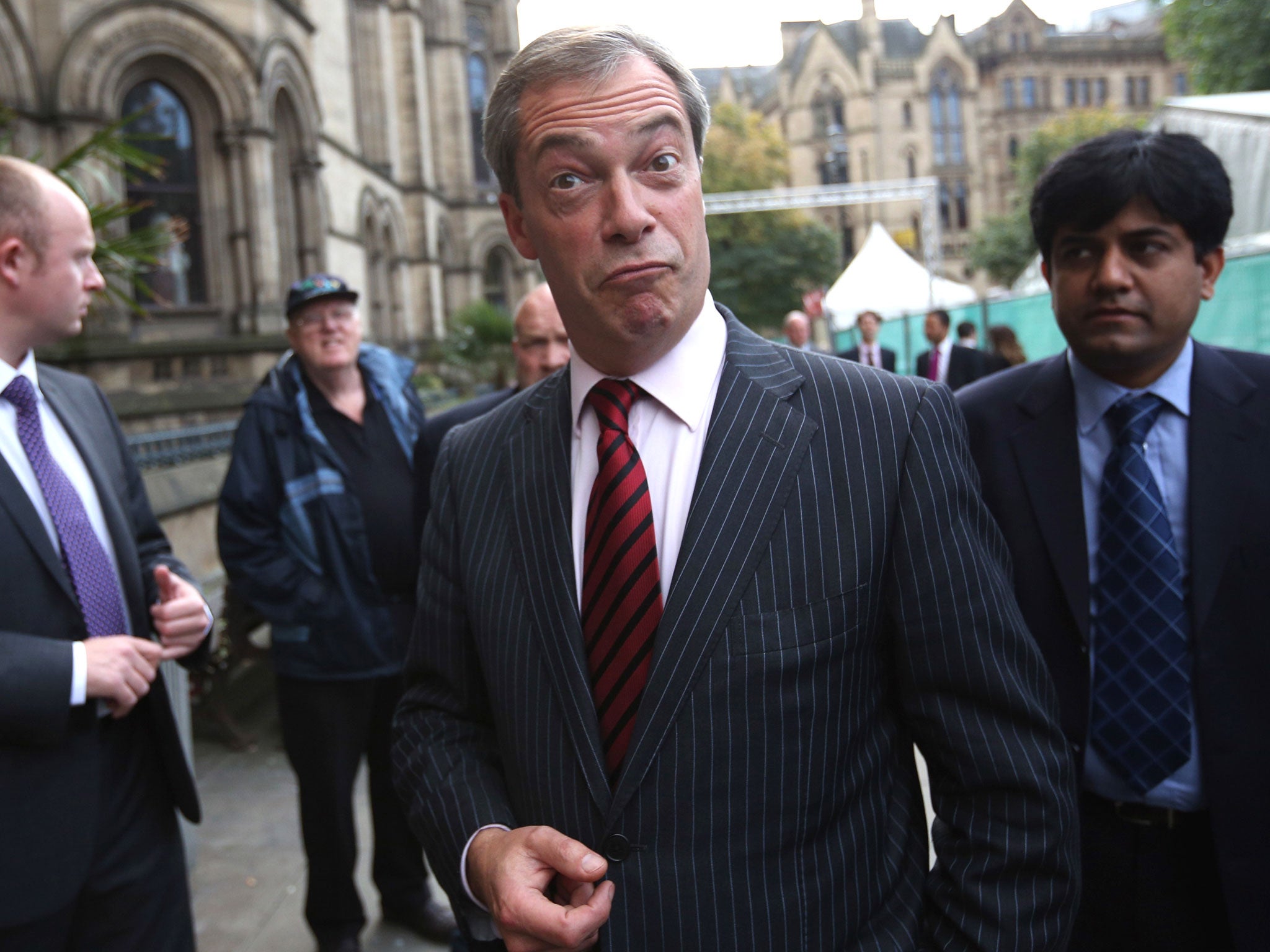 Nigel Farage (C), the leader of the UK Independence Party