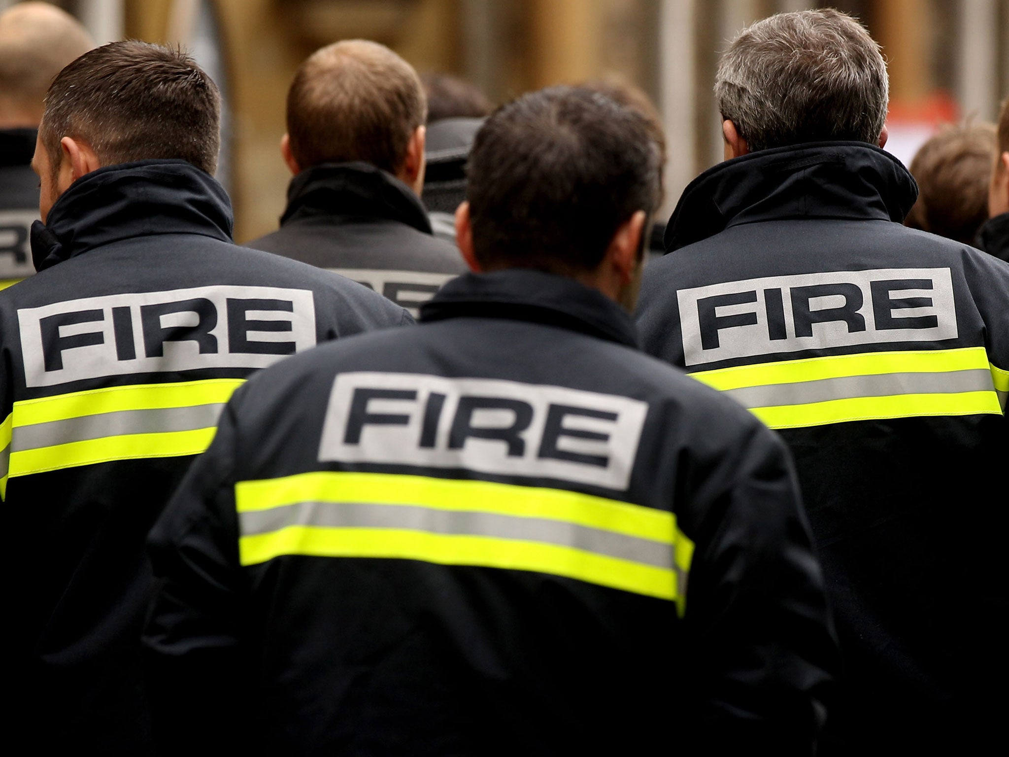 Firefighters arrive to attend a meeting of the Fire Brigades Union in London.