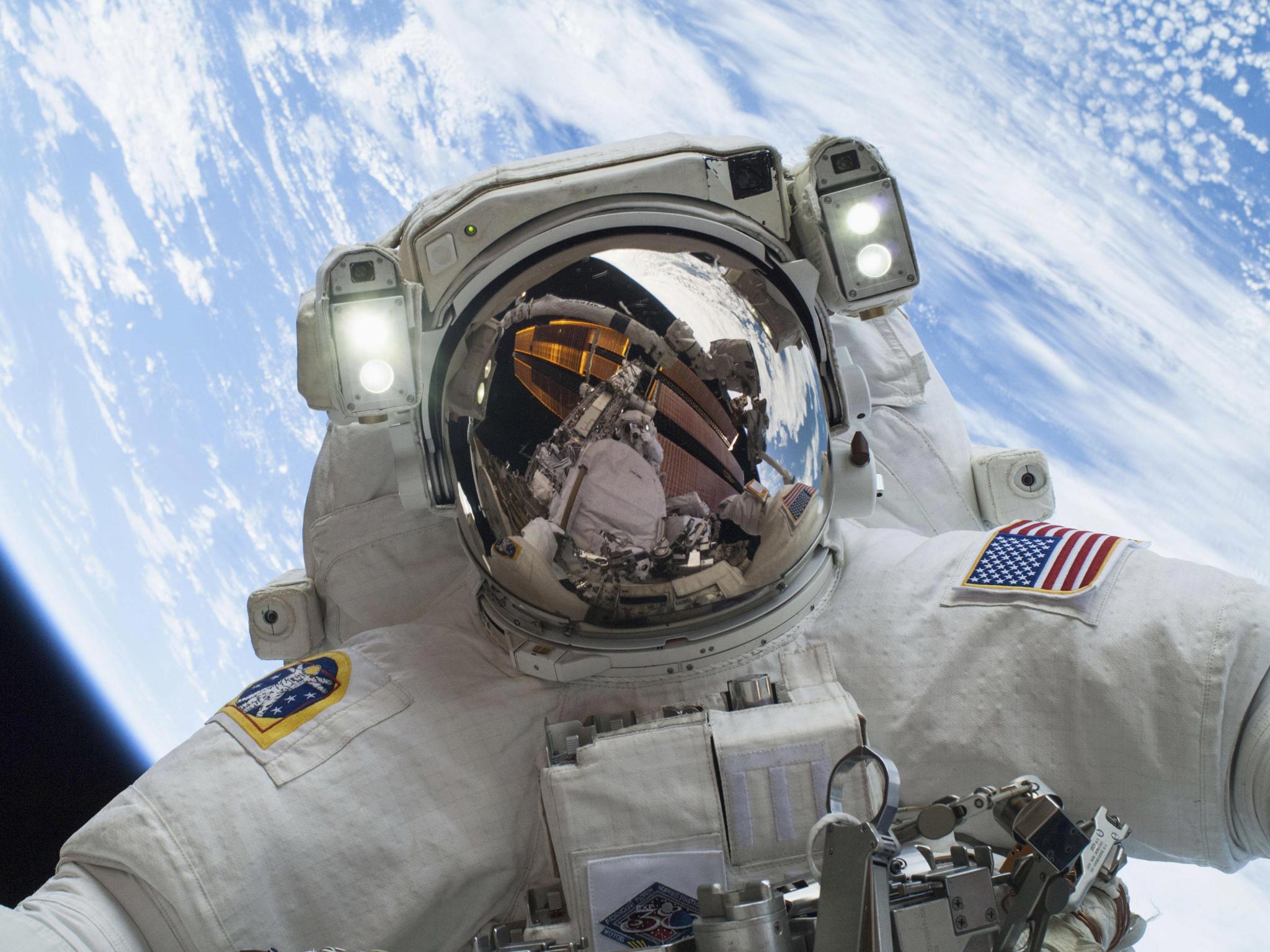Astronaut Mike Hopkins, Expedition 38 Flight Engineer, is shown in this handout photo provided by NASA as he participates in the second of two spacewalks which took place on Christmas eve