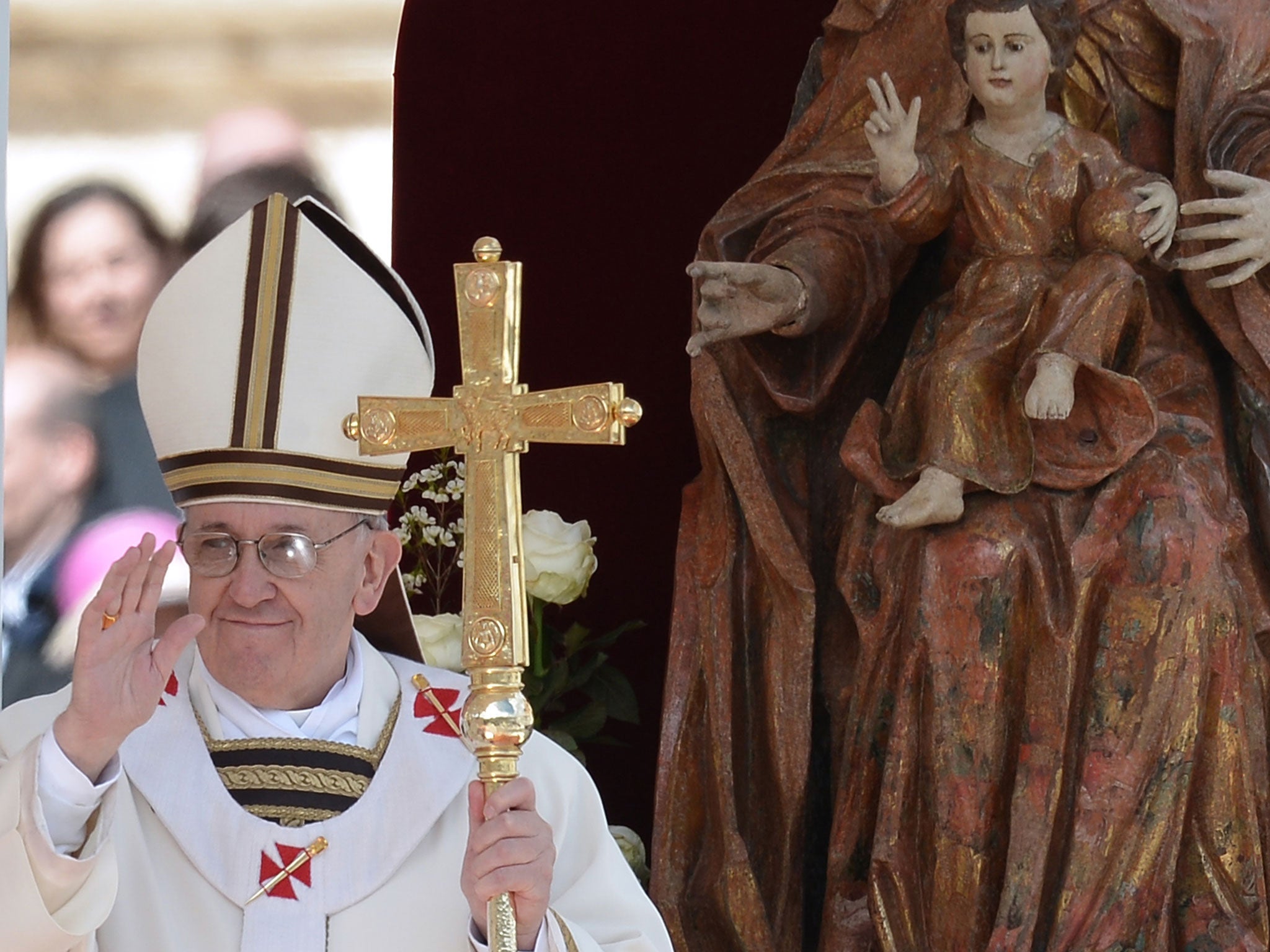 Pope Francis wears his papal vestment during his inauguration mass at St Peter's square as Latin America's first pontiff