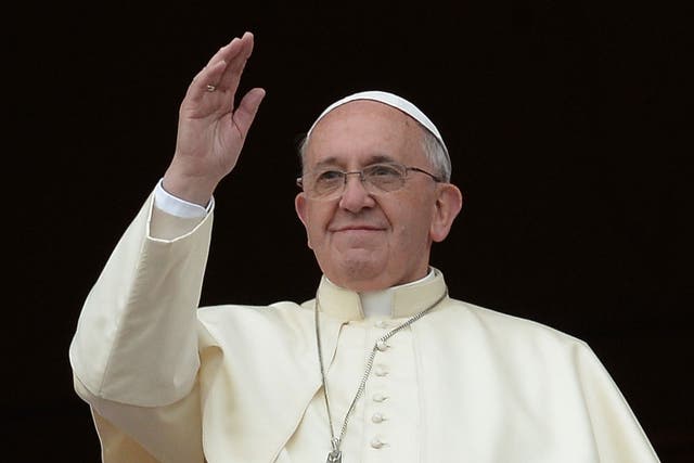 Fashion experts said the Pope's unadorned regalia has made him likeable and approachable 