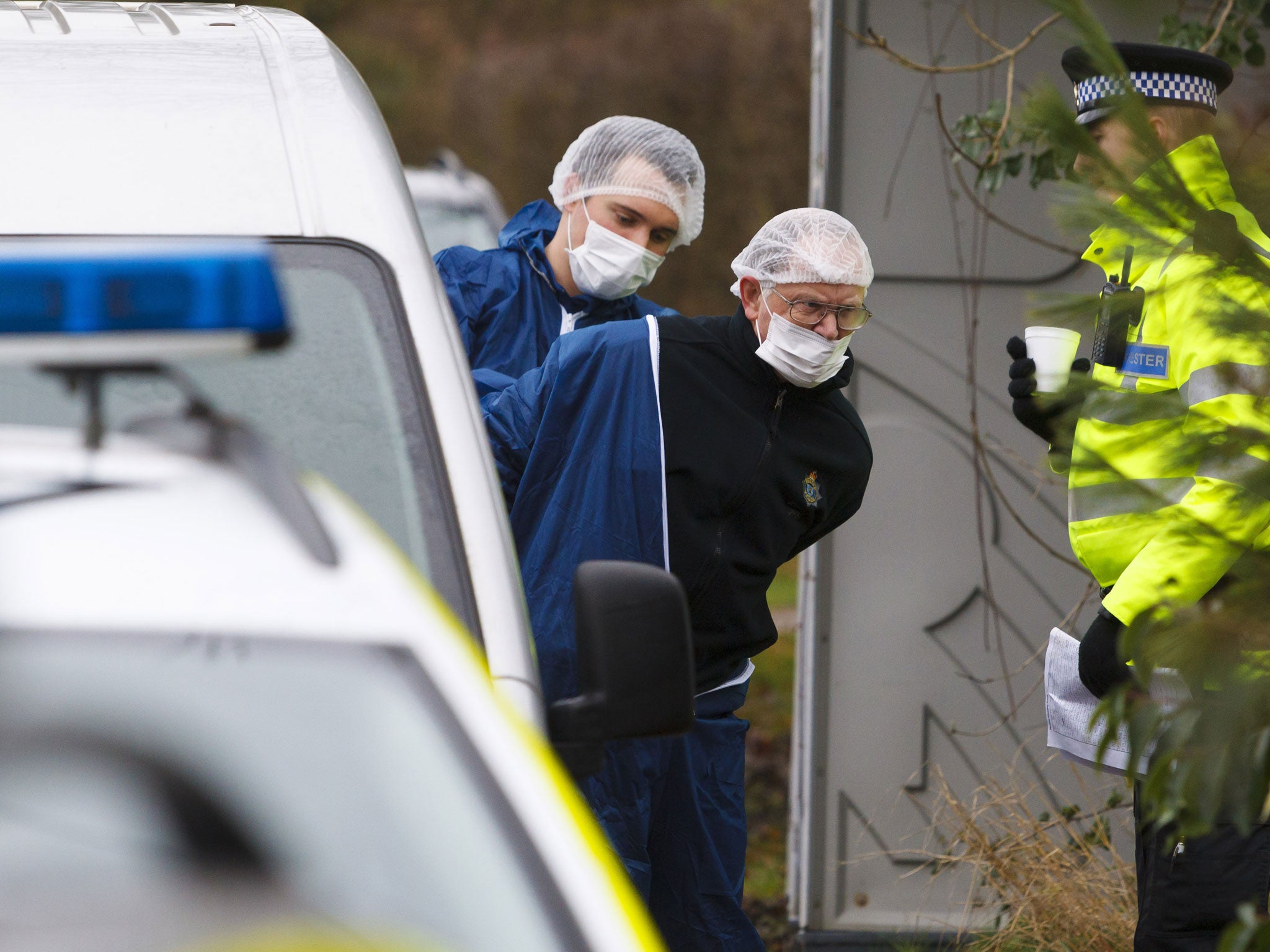 Police forensics arrive at a house in Smuggler's Lane, Bosham, West Sussex, where 55-year-old Valerie Graves was found murdered