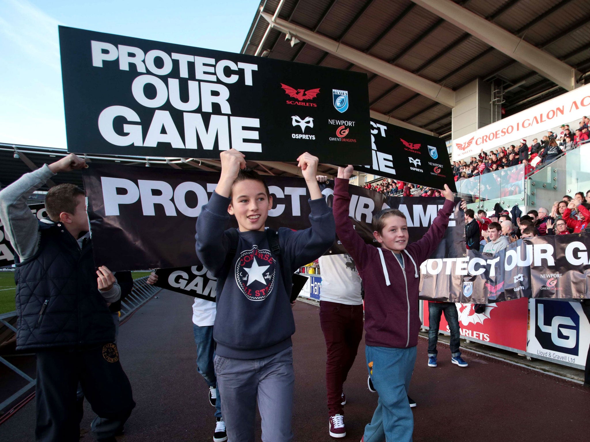 Fans protest before kick off of the game between Scarlets and Ospreys. The four Welsh regional teams have confirmed that they would not sign an extension to their participation agreement with the national governing body