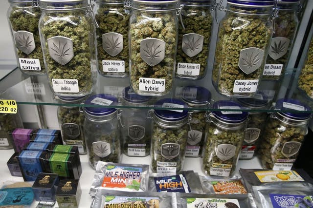 In this Dec. 27, 2013 photo, marijuana and cannabis-infused products are displayed for sale at Medicine Man marijuana dispensary, which is to open as a recreational retail outlet at the start of 2014, in Denver. Colorado is making final preparations for m