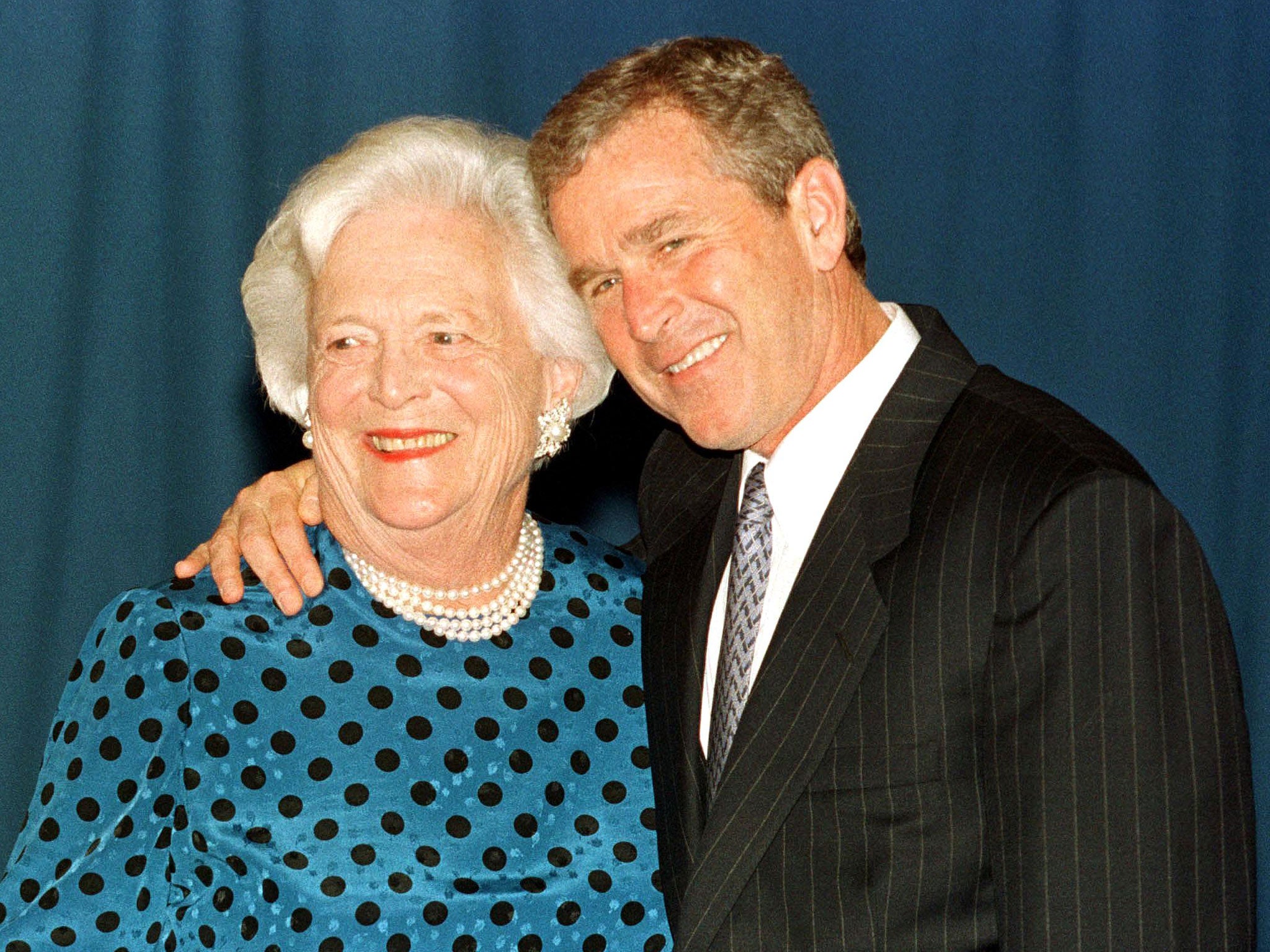 Barbara Bush poses next to former US President and son George W Bush