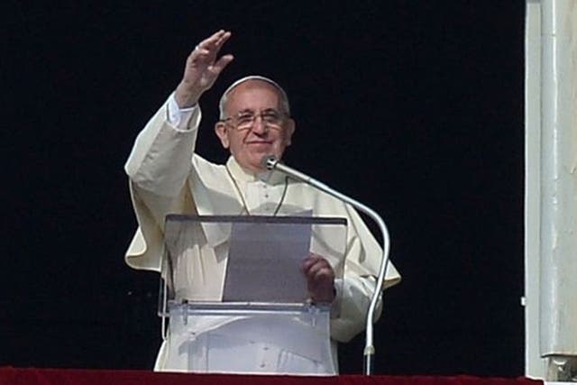 Pope Francis addresses crowds on New Year's day in St Peter's Square