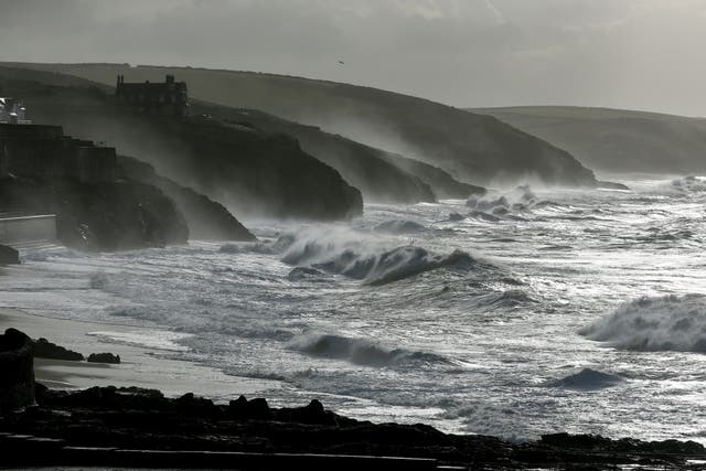 Large waves break along the coast at Porthleven, Cornwall where a 26-year-old man went missing on New Year's Eve. 