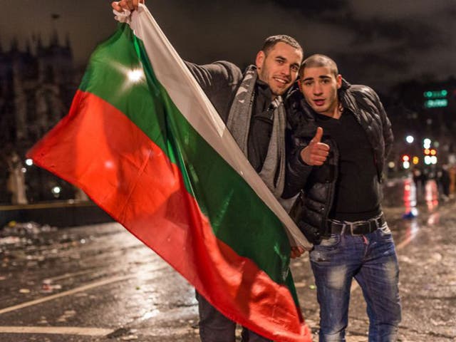 Two Bulgarians in London yesterday, the day restrictions were lifted allowing their countrymen to live and work in Britain 