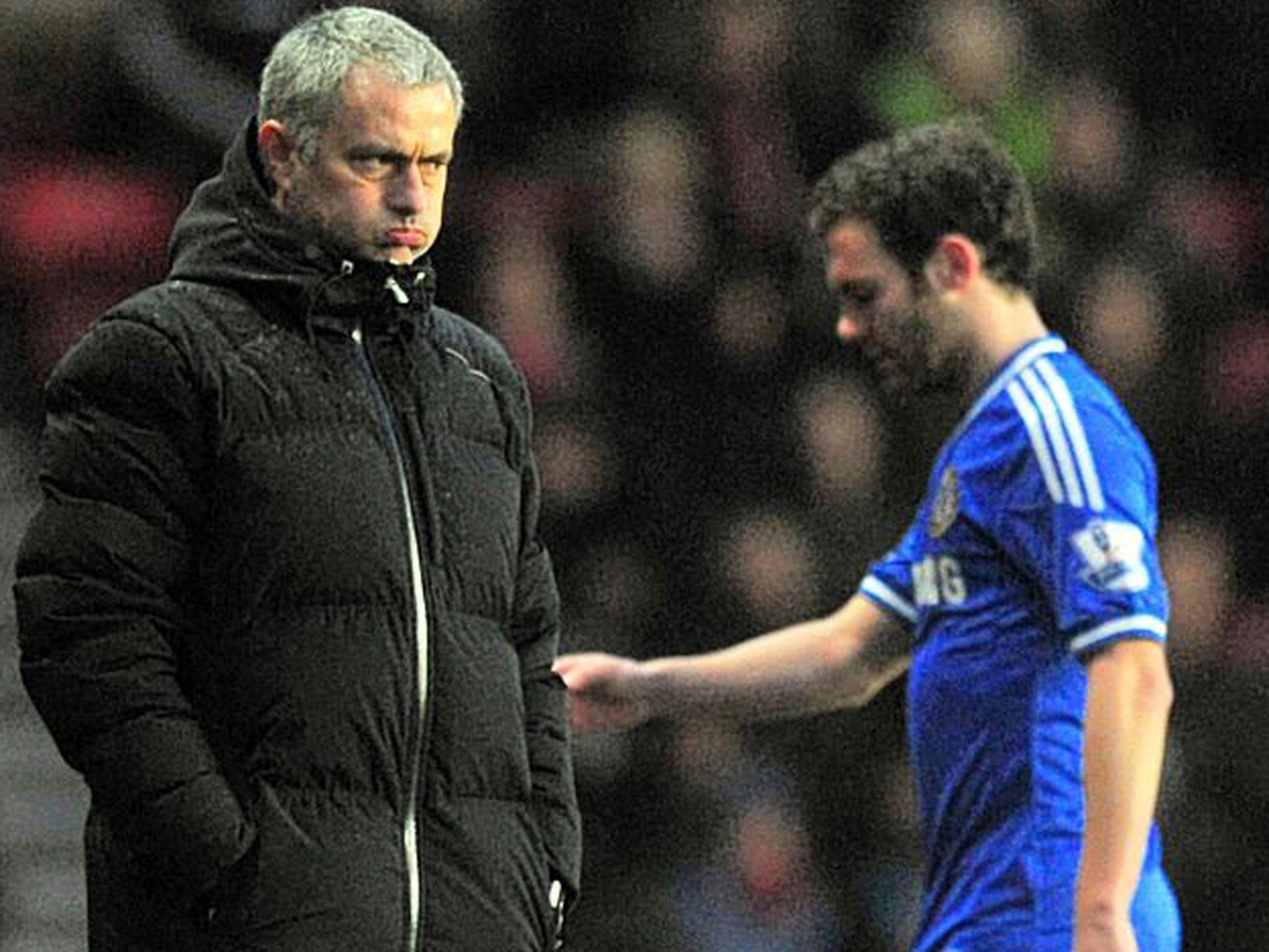 Juan Mata walks past Jose Mourinho and coule be on his way to Spain