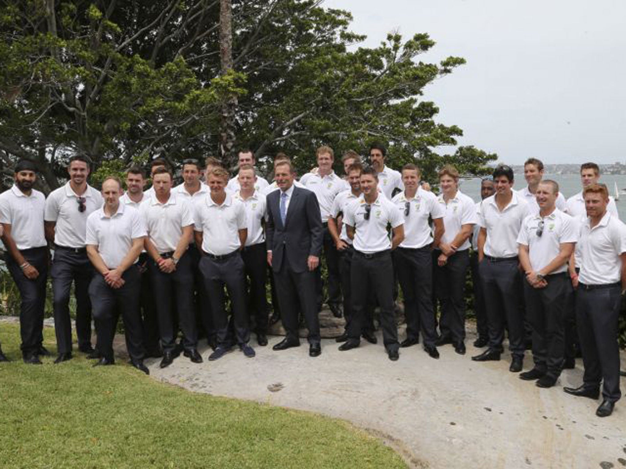 England and Australia players line up with the prime minister of Australia, Tony Abbott, at a New Year’s Day reception at Kirribilli House in Sydney