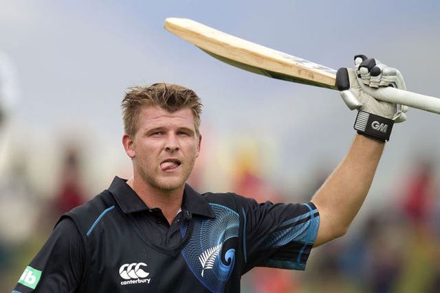 Corey Anderson celebrates after scoring the fastest century in history 