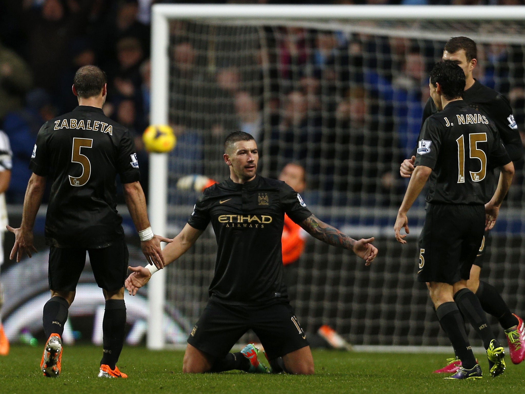Aleksandar Kolarov celebrates after scoring for Manchester City in the 3-2 win over Swansea