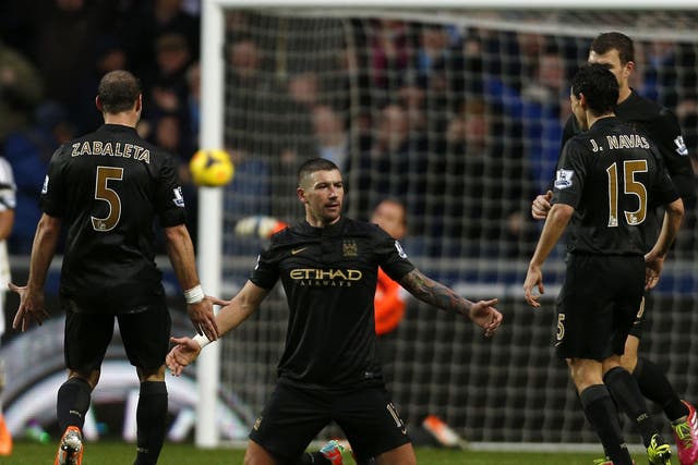 Aleksandar Kolarov celebrates after scoring for Manchester City in the 3-2 win over Swansea