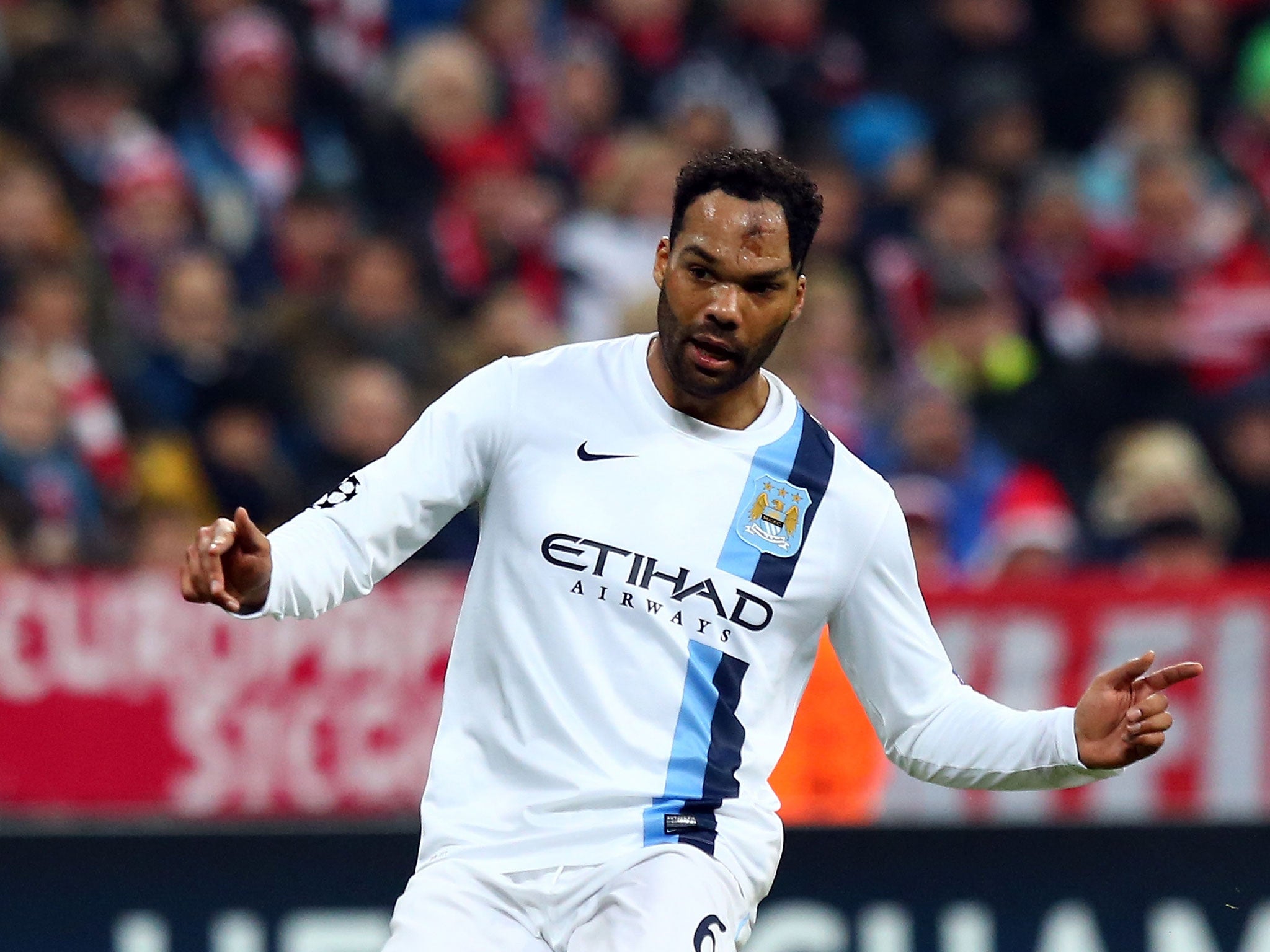 Manchester City defender Joleon Lescott will be staying at the Etihad